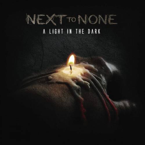 NEXT TO NONE - A Light In The Dark cover 