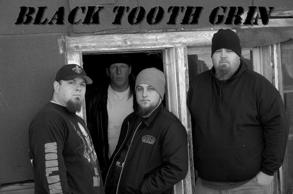 BLACK TOOTH GRIN picture